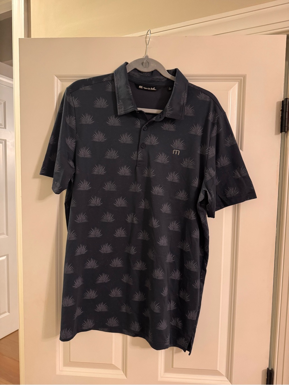 Travis Mathew Navy Polo with Subtle Palm Print